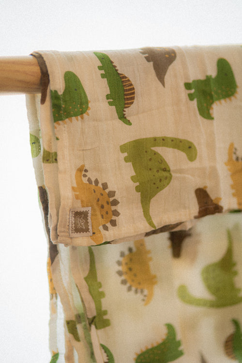Lange en mousseline – Motif dinosaures sur fond crème